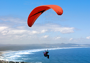 Paragliding Over the Ocean